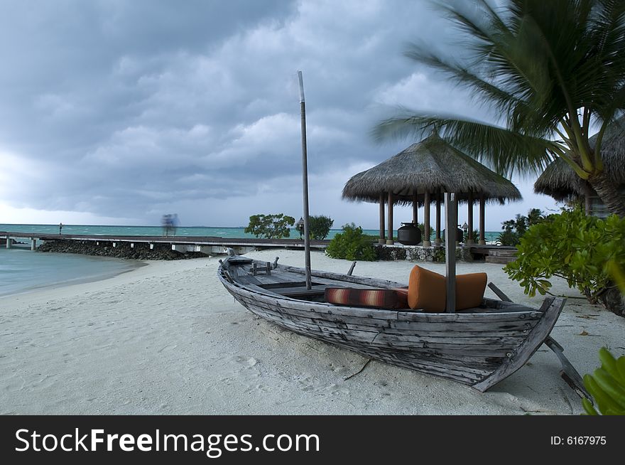 Boat on the shore in Maldives on a windy day. Boat on the shore in Maldives on a windy day