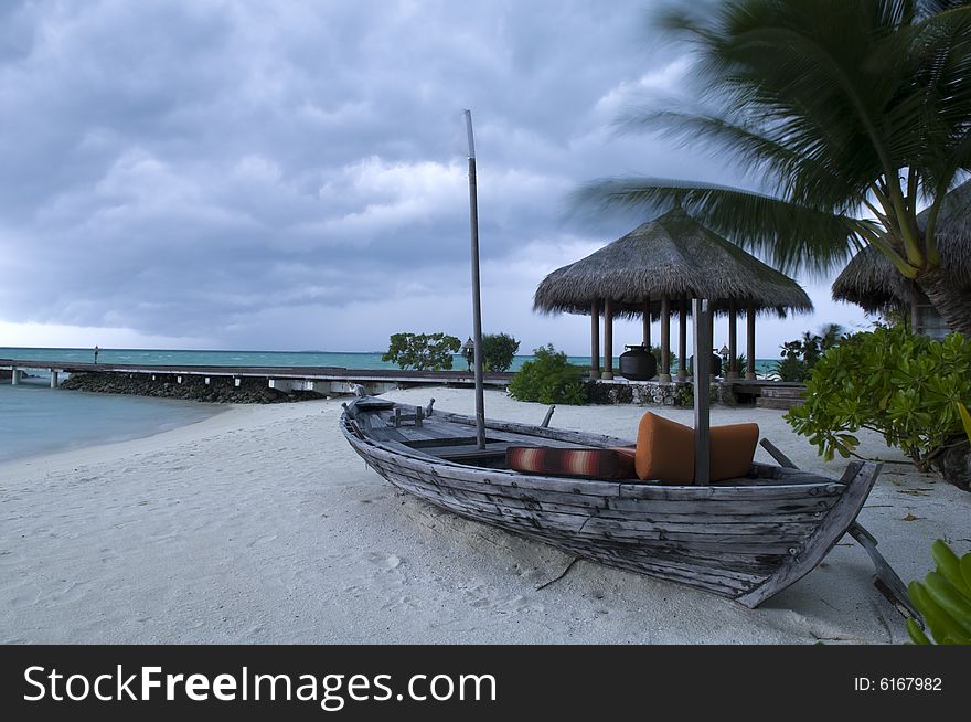 Boat on the shore in Maldives on a windy day. Boat on the shore in Maldives on a windy day