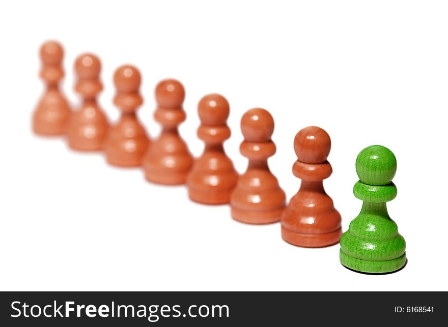 A green chess piece signifying standing out from the crowd and uniqueness. A green chess piece signifying standing out from the crowd and uniqueness