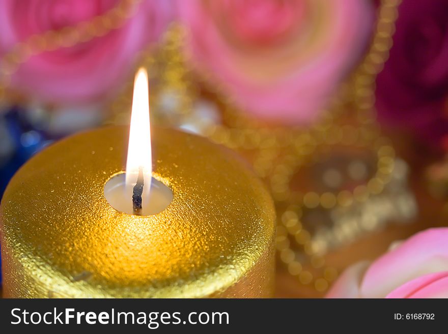 A close view of gold candle. A close view of gold candle