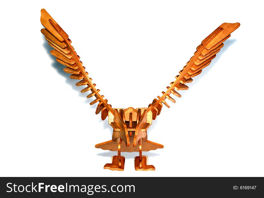 Wooden eagle puzzle white background