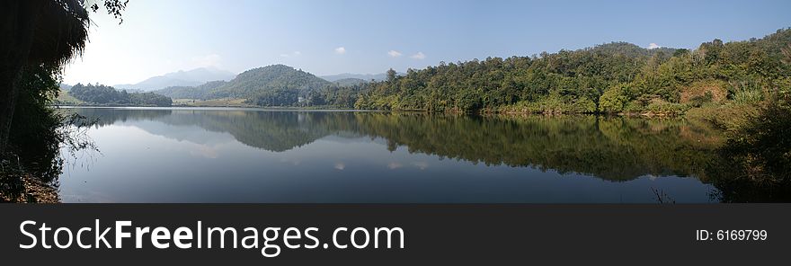 A Panorama picture taken from a reservoir in the chiang mai country side. A Panorama picture taken from a reservoir in the chiang mai country side.