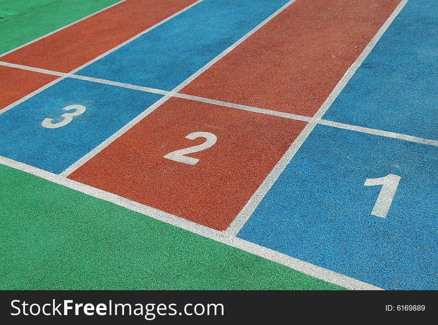The colorful courses with white numbers on the playground. The colorful courses with white numbers on the playground.