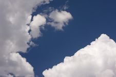 Puffy Clouds On A Blue Sky. Stock Photography