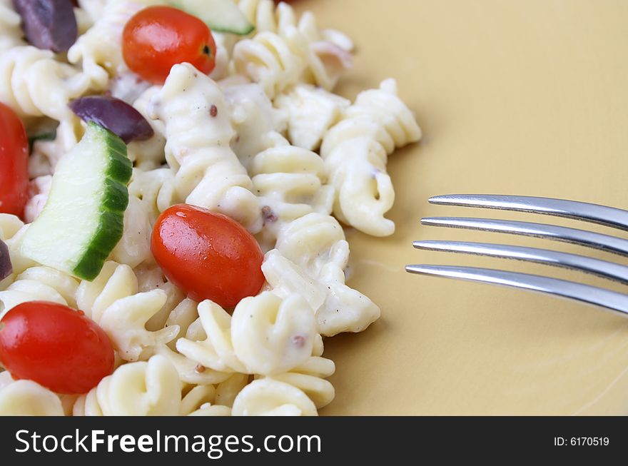 Cold Pasta Salad with tomatoes, cucumbers and olives. Cold Pasta Salad with tomatoes, cucumbers and olives