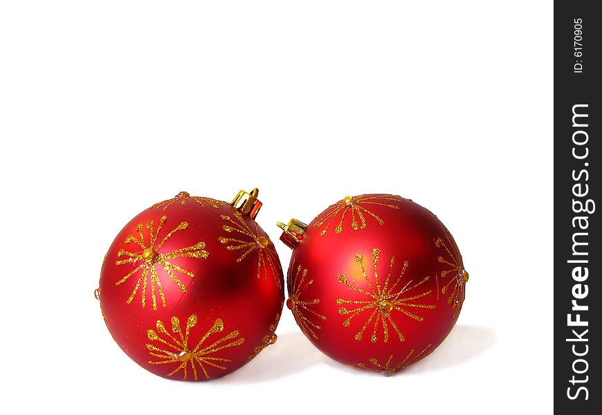 Two red christmas balls isolated on white