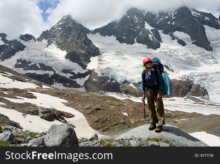 Backpacker Woman In Mountains