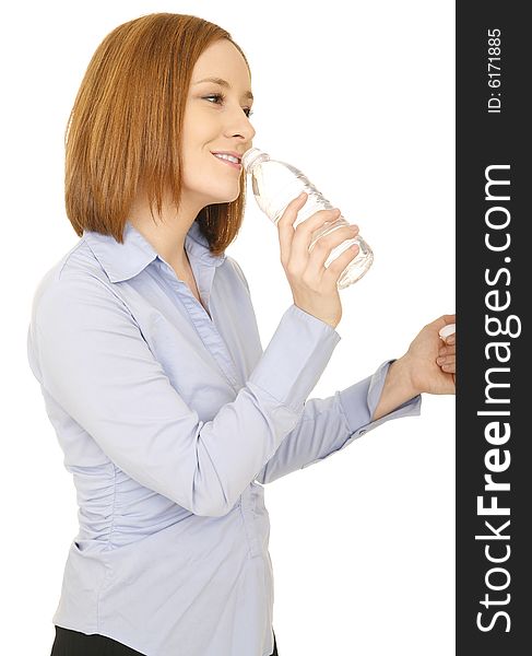 Shot of woman in casual dress with happy expression drinking bottle water. Shot of woman in casual dress with happy expression drinking bottle water