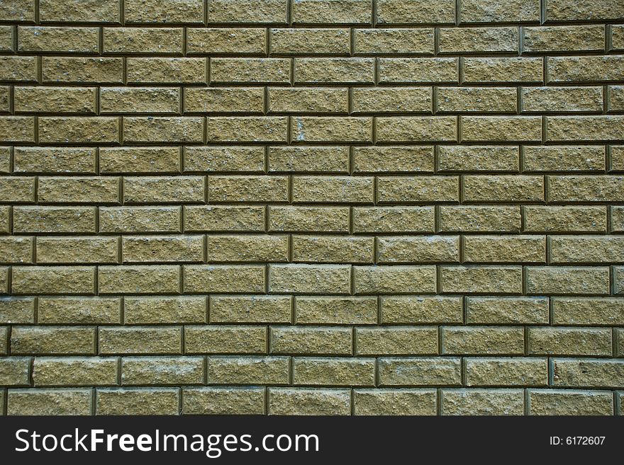 A modern yellow brick wall