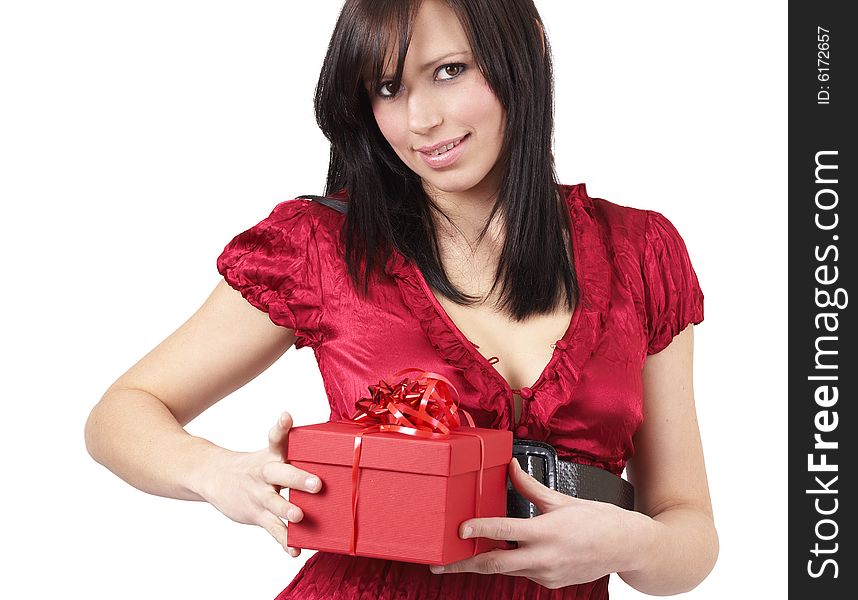 Portrait of a beautiful young brunette woman holding red gift box at a celebration, isolated on white background. Portrait of a beautiful young brunette woman holding red gift box at a celebration, isolated on white background