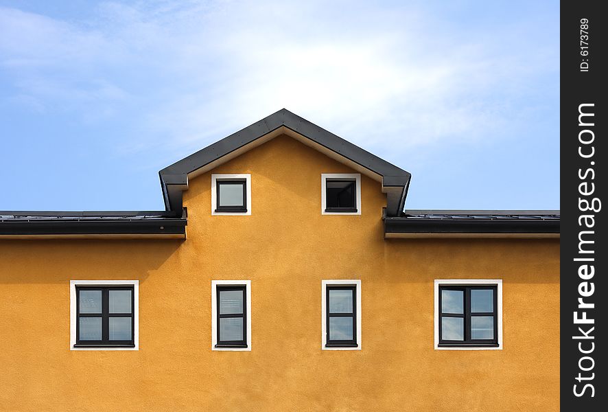 Orange Building And Blue Sky