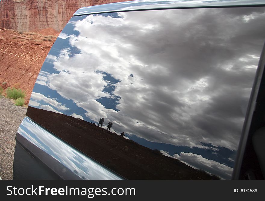 Reflection of tourists admiring the beauty of the Capitol reef national park. Utah. USA. Reflection of tourists admiring the beauty of the Capitol reef national park. Utah. USA