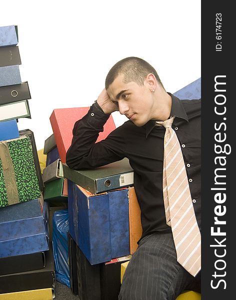 Young man with registers relaxing