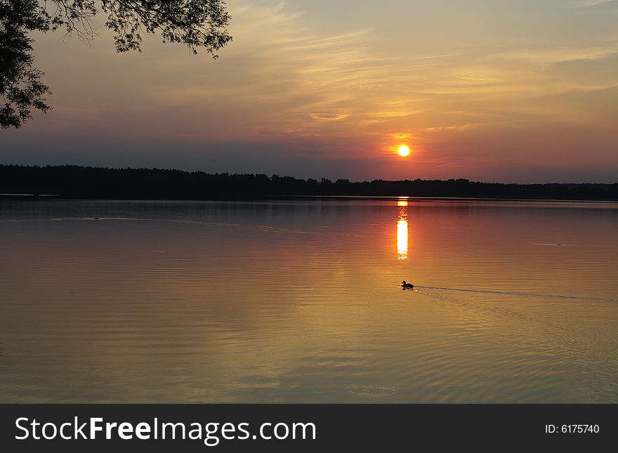 Sunset over lake in Poland