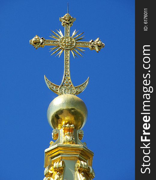 Gold orthodoxy cross on blue