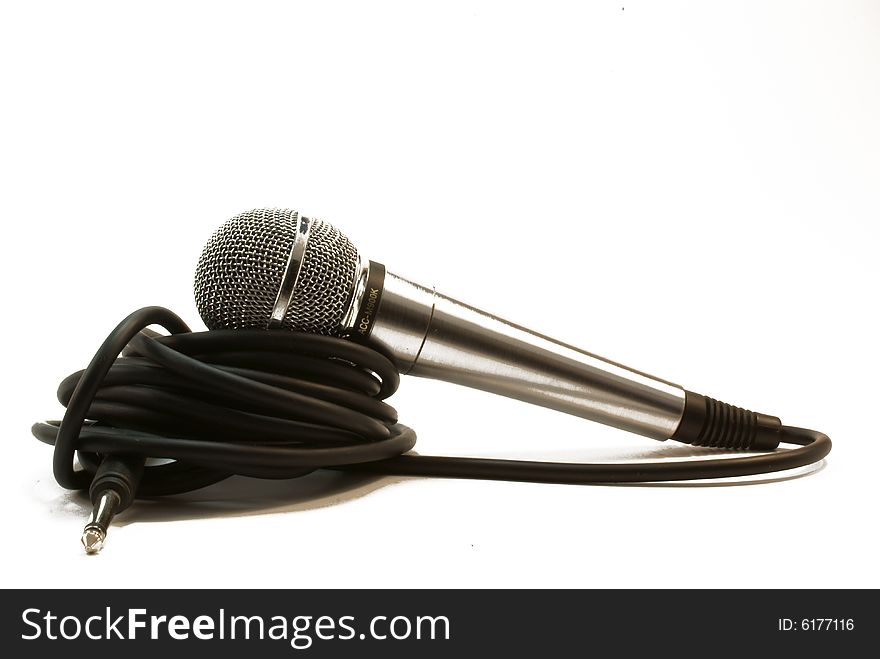 Microphone with a wire on white background