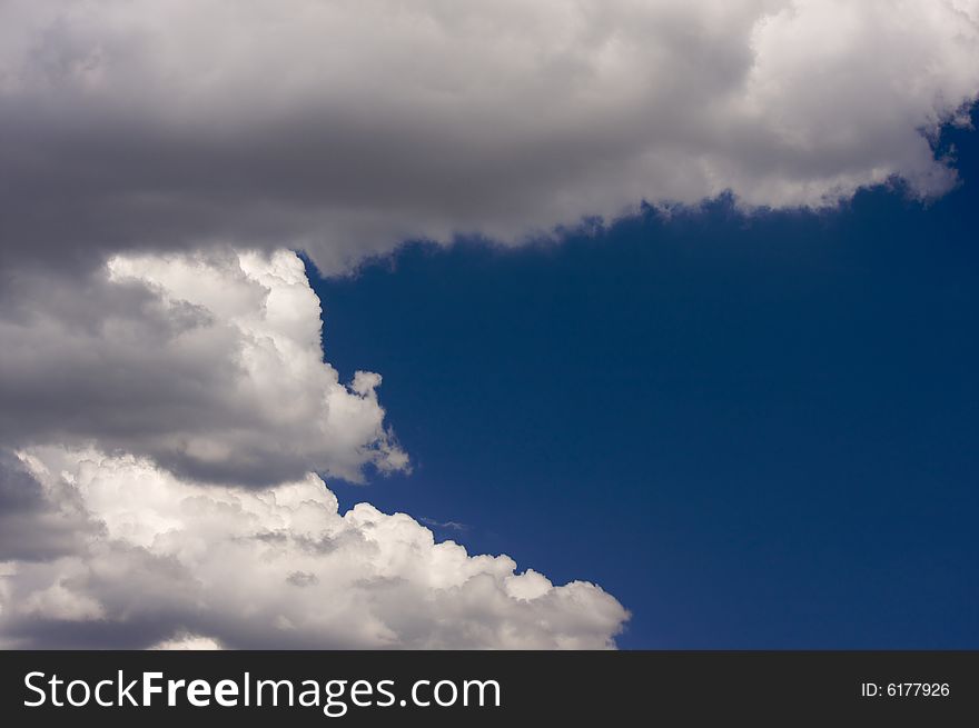 Puffy Clouds on a blue sky.