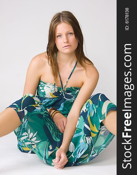 Portrait of young beautiful woman on white background