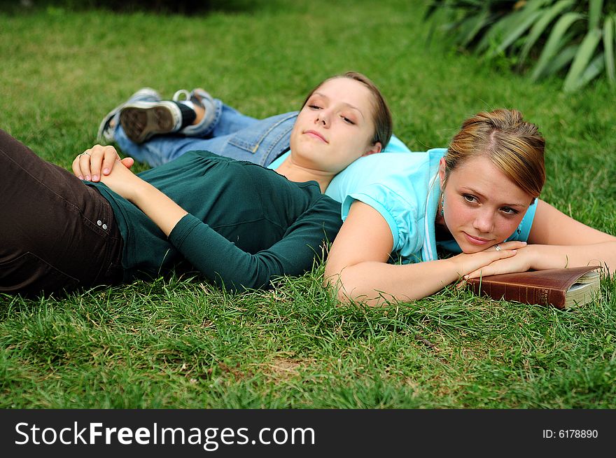 Student Reading in a public park