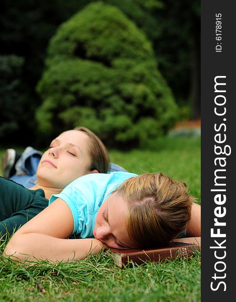 Student Reading in a public park