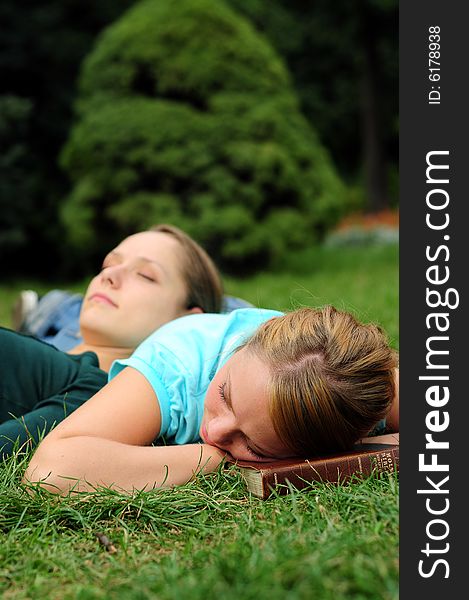 Student Reading in a public park