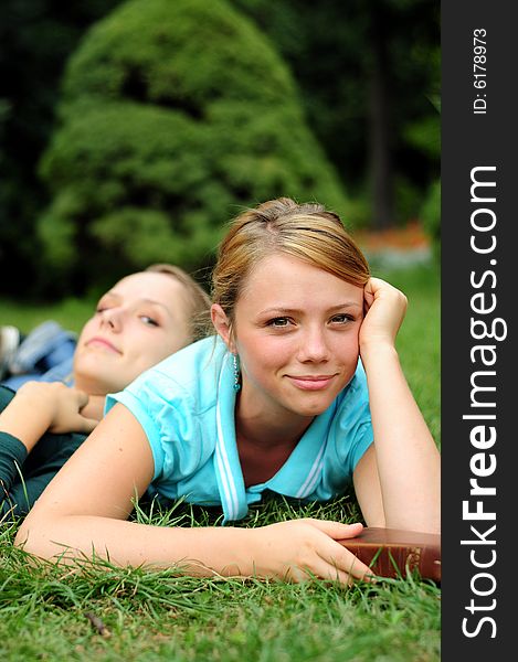 Student Reading in a public park