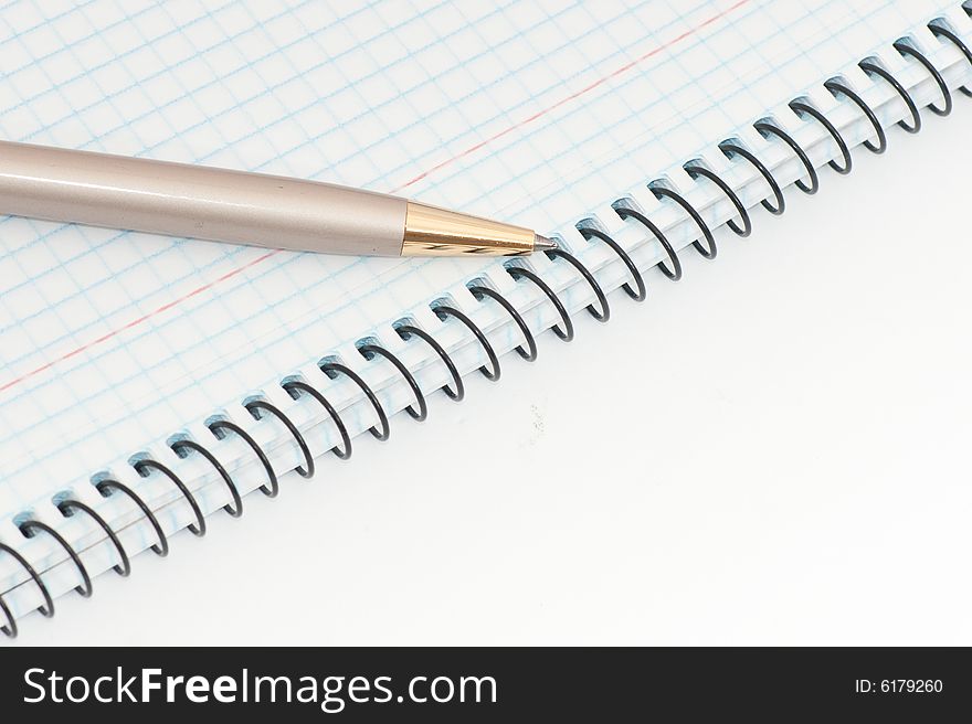 Notebook with pen on white background. Notebook with pen on white background