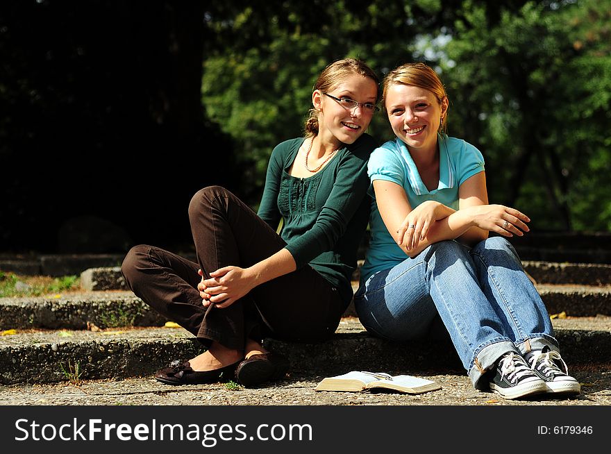 Student Reading in a public park