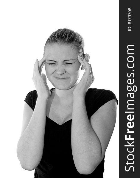 Teenage rubbing her temples to soothe headache. Teenage rubbing her temples to soothe headache.