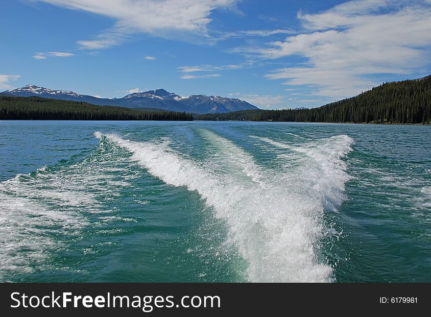 Waves caused by the Motor Boat driving on the Magline Lake Jasper National Park Alberta Canada