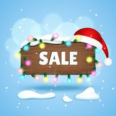 Wooden Sign With Sale Text, Christmas Lights And Christmas Hat Royalty Free Stock Images Wooden Sign With Sale Text, Christmas Lights And Christmas Hat Royalty Free Stock Images