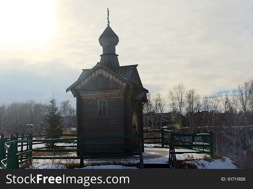 Small wooden chapel in winter