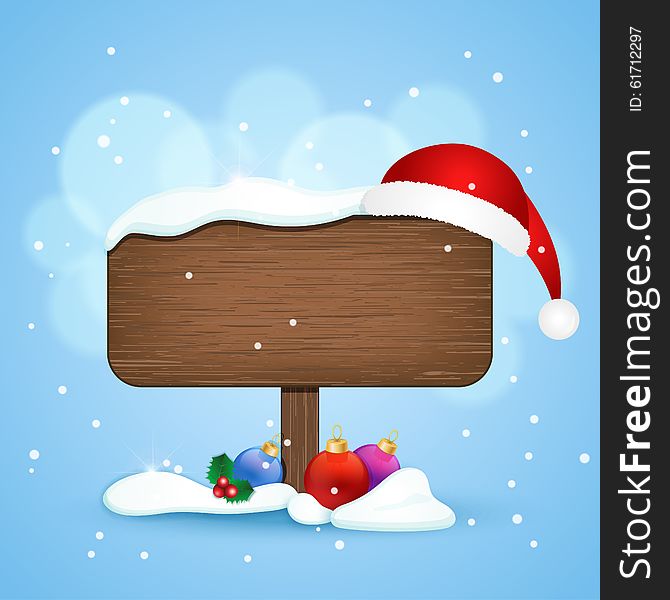 Wooden Sign With Christmas Hat And Baubles In The Snow