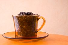 Orange Cup With Coffee Beans Royalty Free Stock Photography Orange Cup With Coffee Beans Royalty Free Stock Photography
