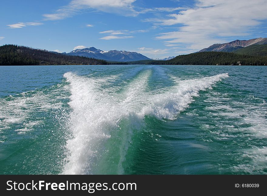Waves caused by the Motor Boat driving on the Magline Lake Jasper National Park Alberta Canada