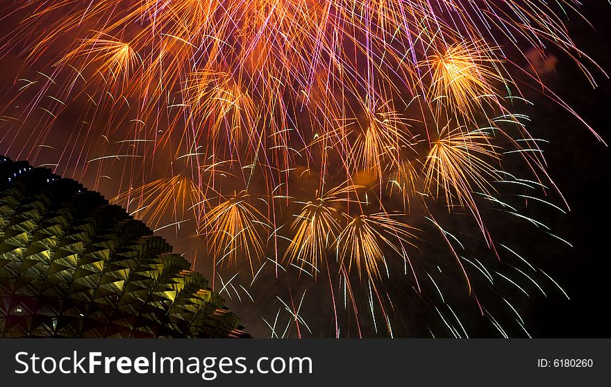 Fireworks display over the distinctive roof of the Singapore Esplanade Theater. Fireworks display over the distinctive roof of the Singapore Esplanade Theater