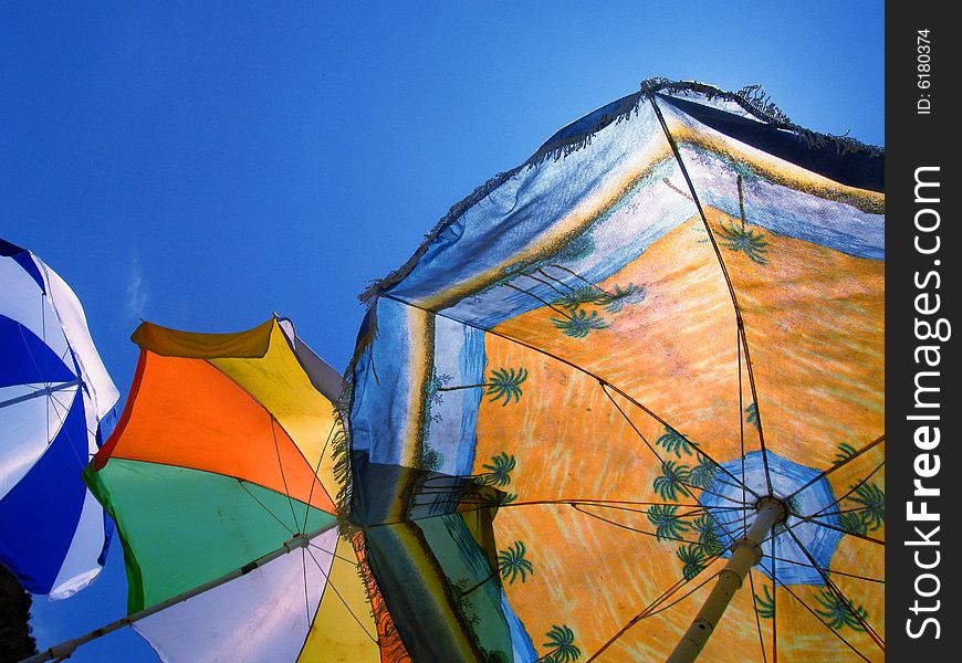 Beach umbrellas with clear blue sky. Beach umbrellas with clear blue sky