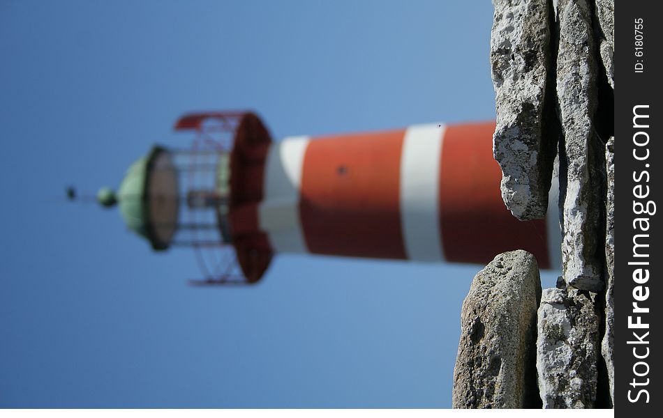 Red and white lighthouse.