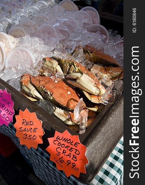 Crabs in ice at market. Vertically framed photo. Crabs in ice at market. Vertically framed photo.