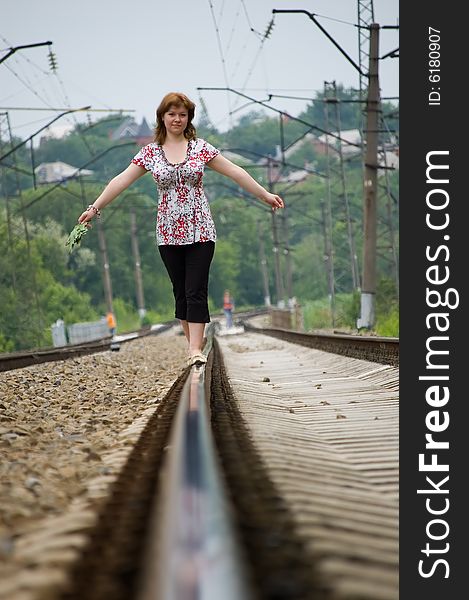 The Girl Walks On Rails