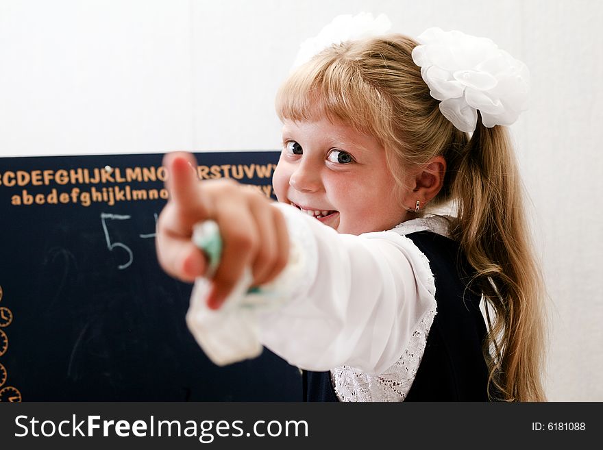 Little Girl Near Chalkboard