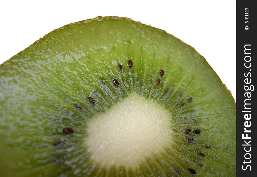 Closeup of a half kiwi fruit isolated on white background