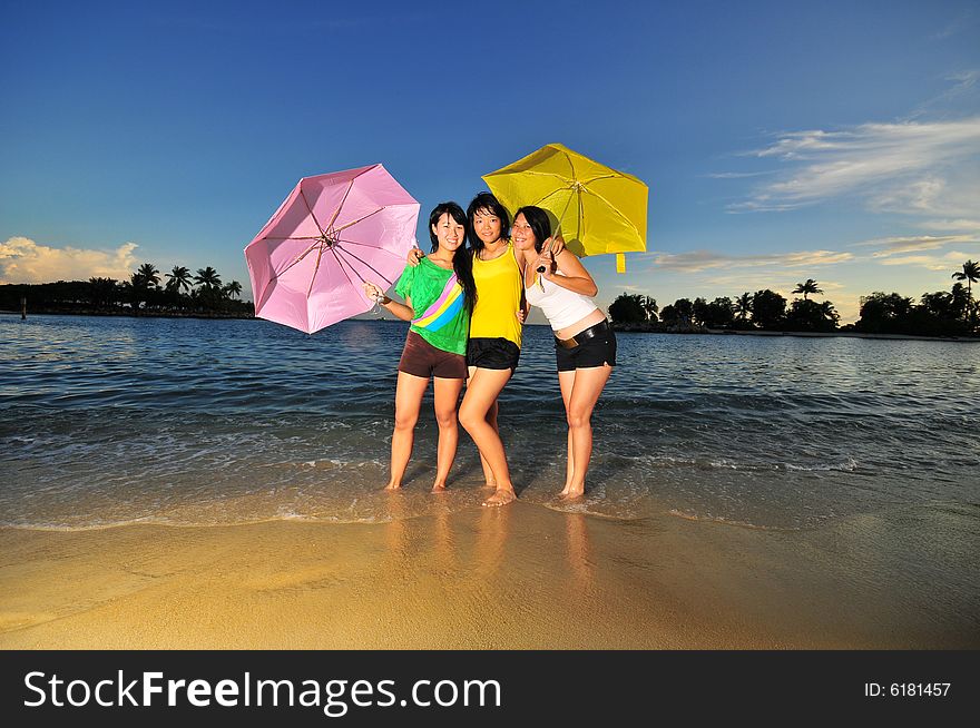 Pictures of smiling faces at the beach. Suitable for joyful themes and bright contexts. Pictures of smiling faces at the beach. Suitable for joyful themes and bright contexts.