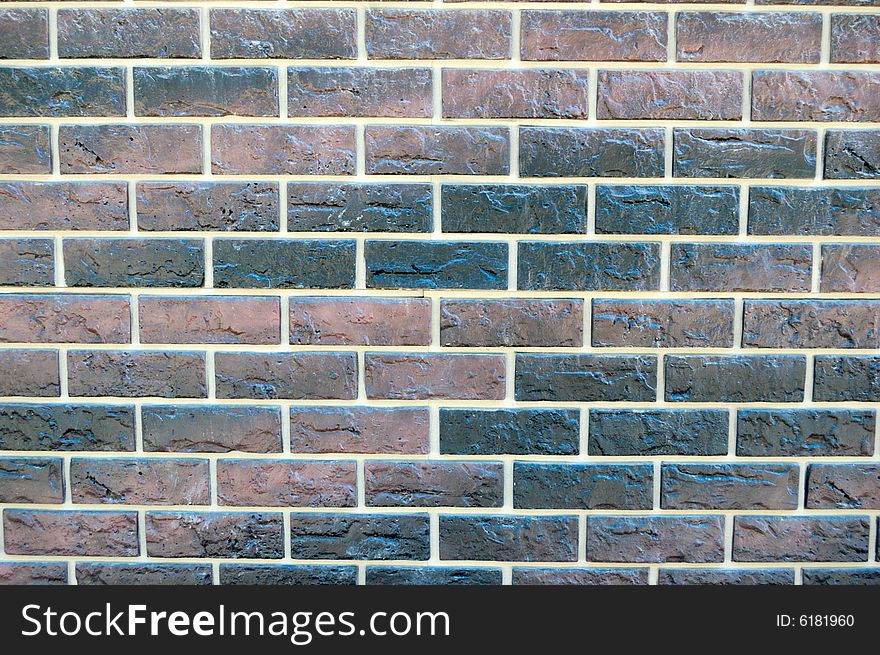 Old-style wall of decorative bricks