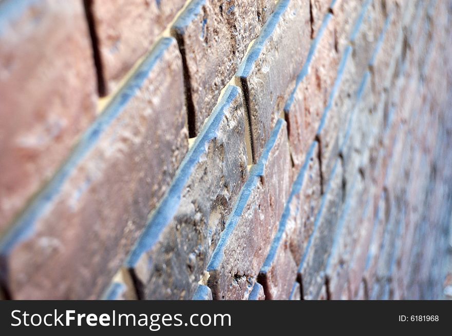 Old-style wall of decorative bricks