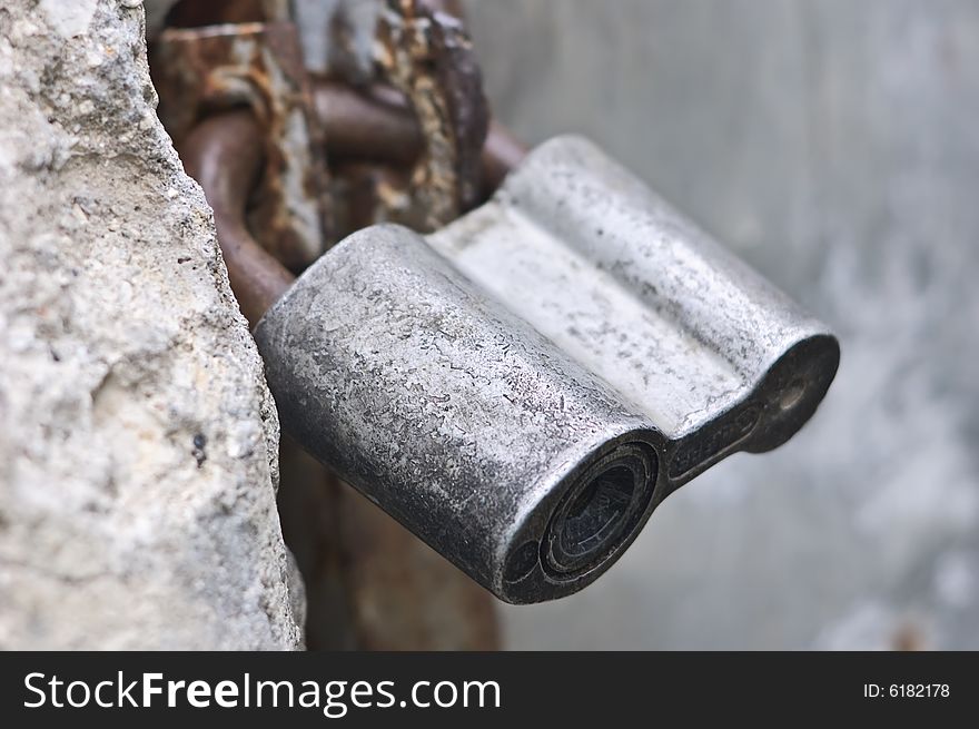 Old iron padlock with blured background. Old iron padlock with blured background