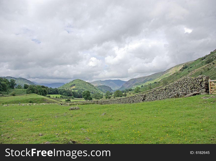 View across the fells in the Lake District Cumbria England. View across the fells in the Lake District Cumbria England.