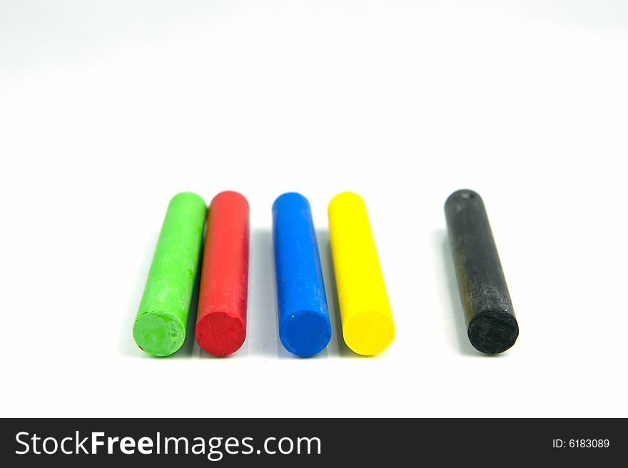 Oil pastels/crayons isolated against a white background