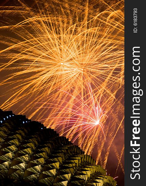 Fireworks display over the distinctive roof of the Singapore Esplanade Theater. Fireworks display over the distinctive roof of the Singapore Esplanade Theater