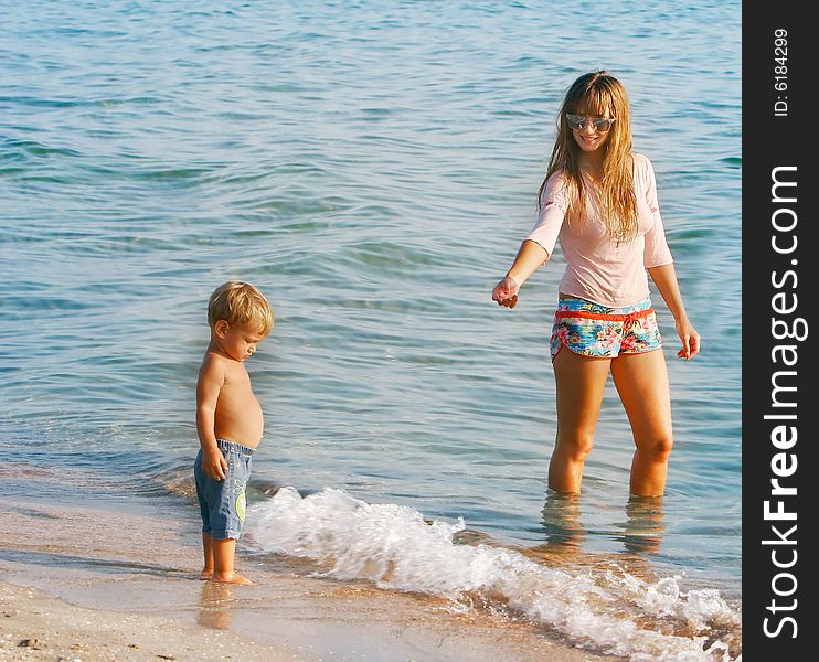 Mother and son on beach